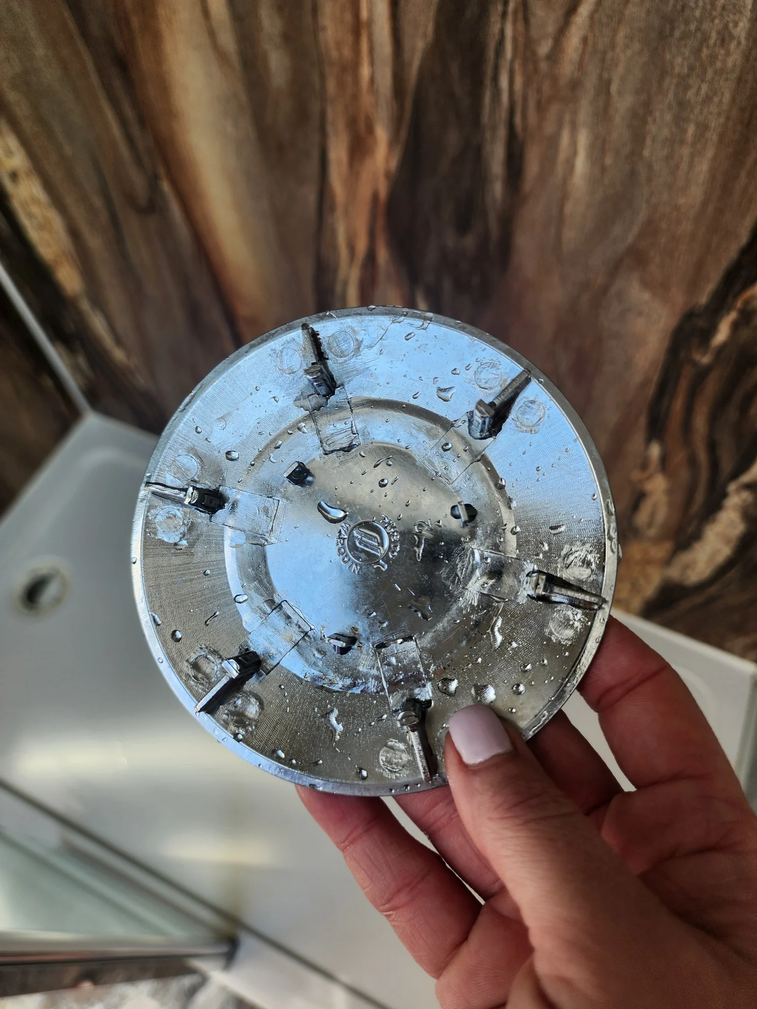 Chrome shower fitting after deep cleaning