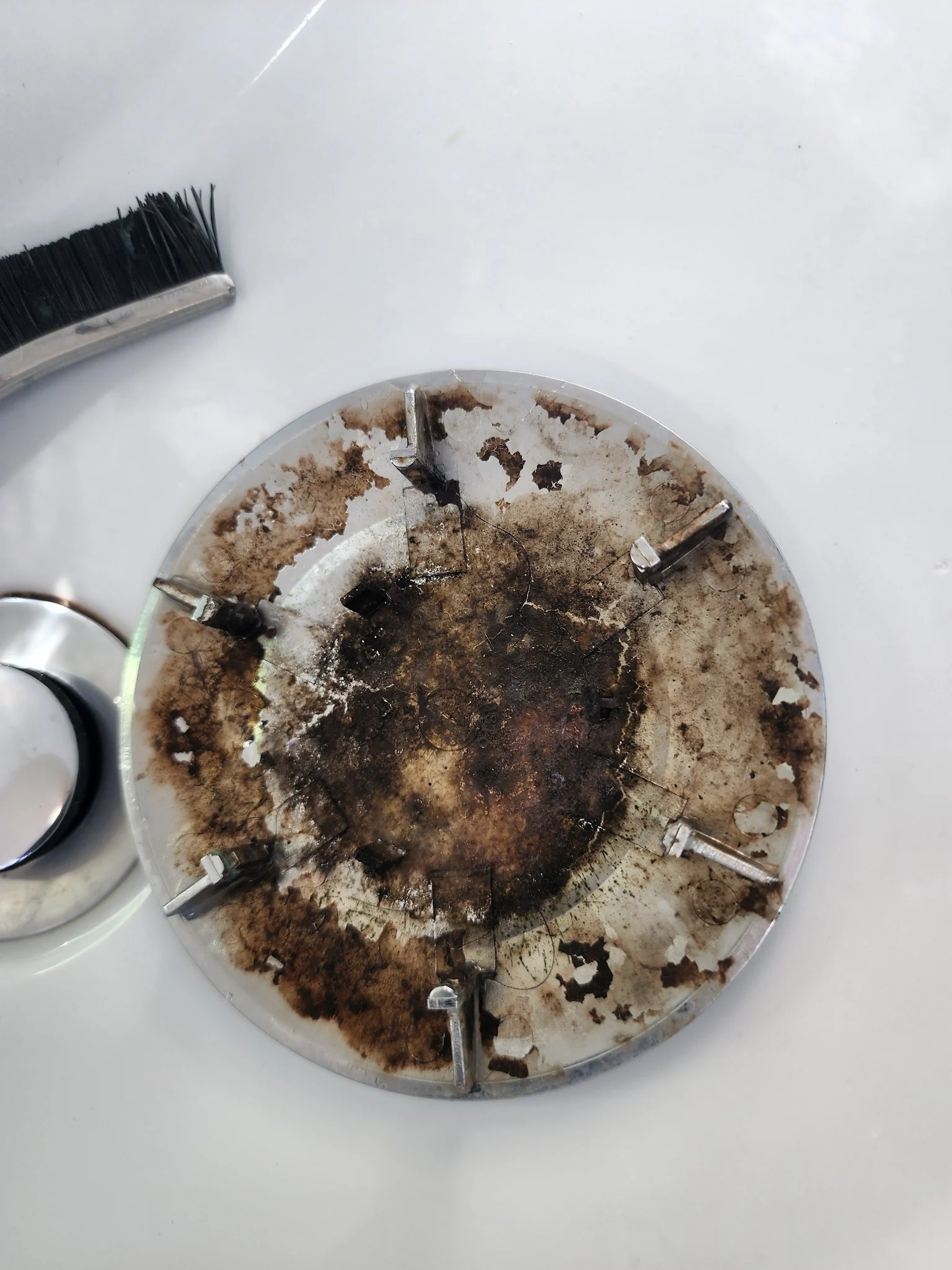 Chrome shower fitting before deep cleaning