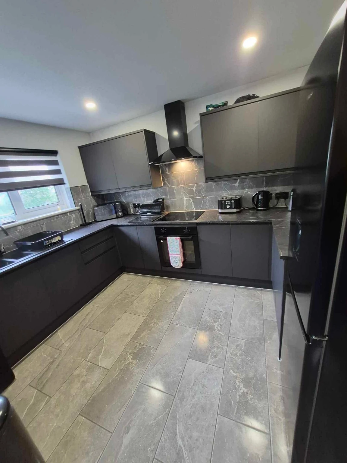 Clean dark kitchen after end of tenancy or deep cleaning