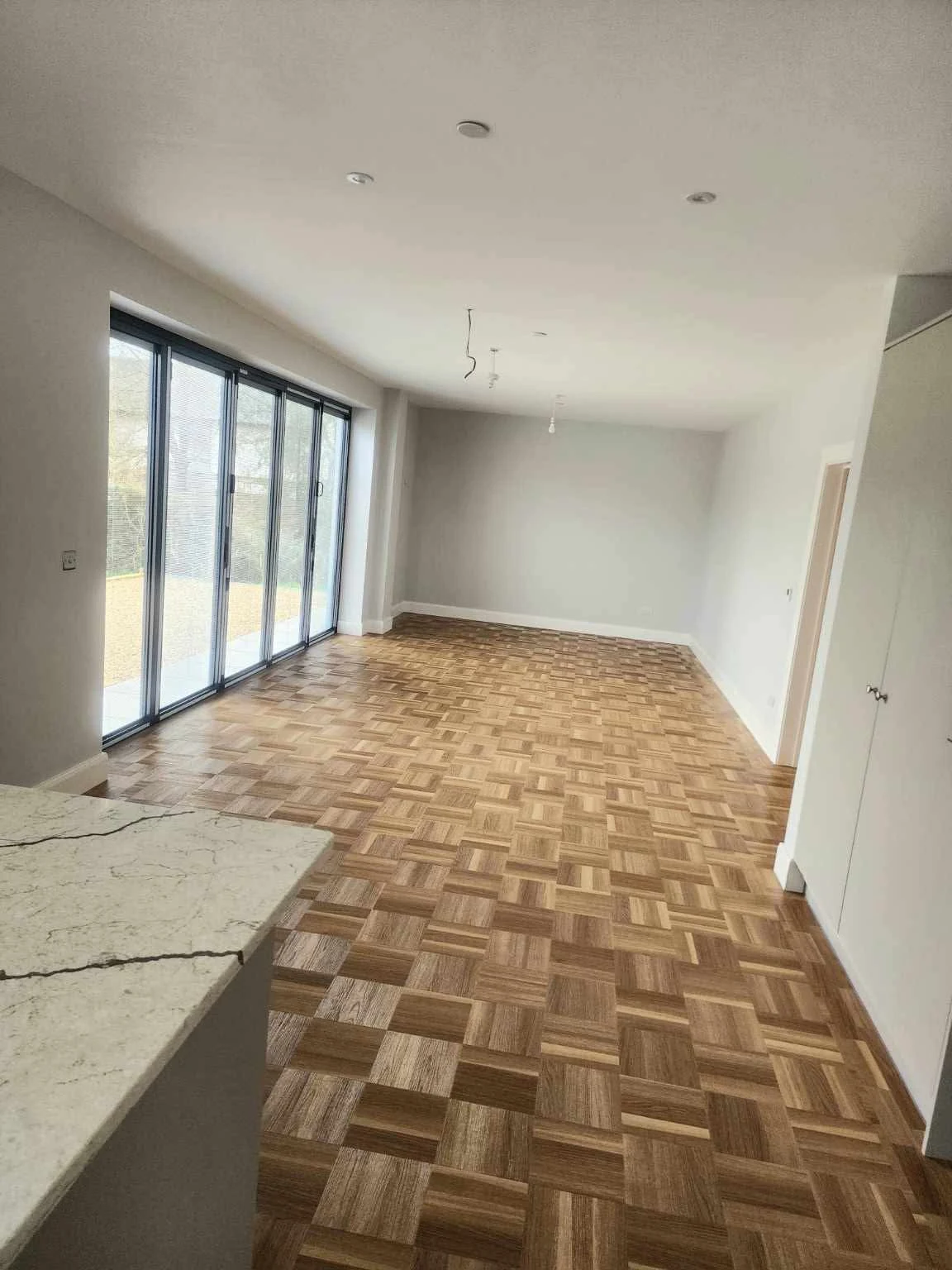 New-build property with large glass doors prepared for handover